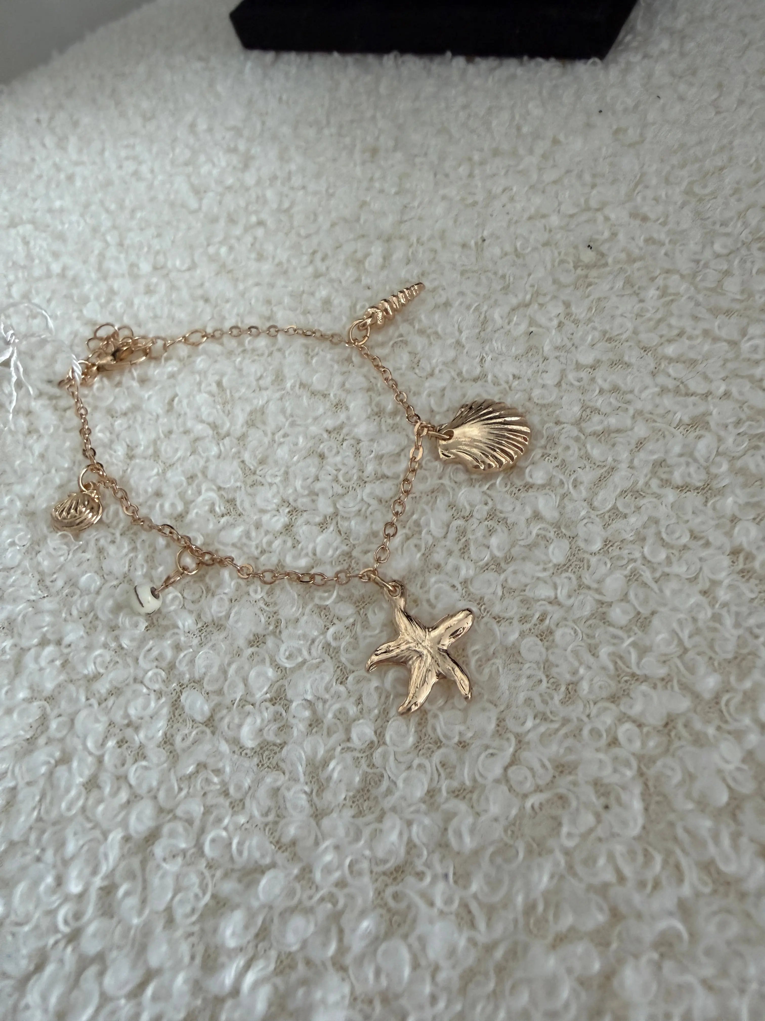 Bracelet charms doré - Étoile de mer Maddy & Co