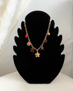 Collier charms doré - Fleur et cerise Maddy & Co